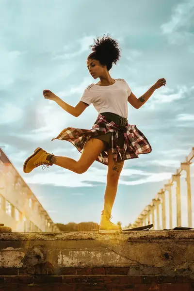 A woman dancing. Dance when the music moves you.